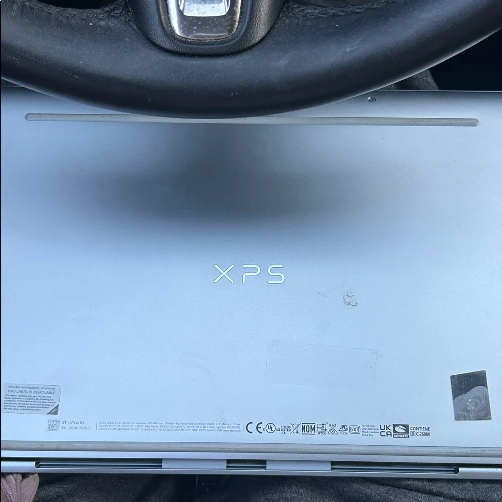 Dell Metallic Blue Laptop with Logo Accent